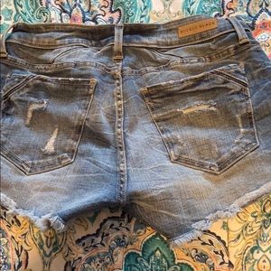 Buckle black jean shorts